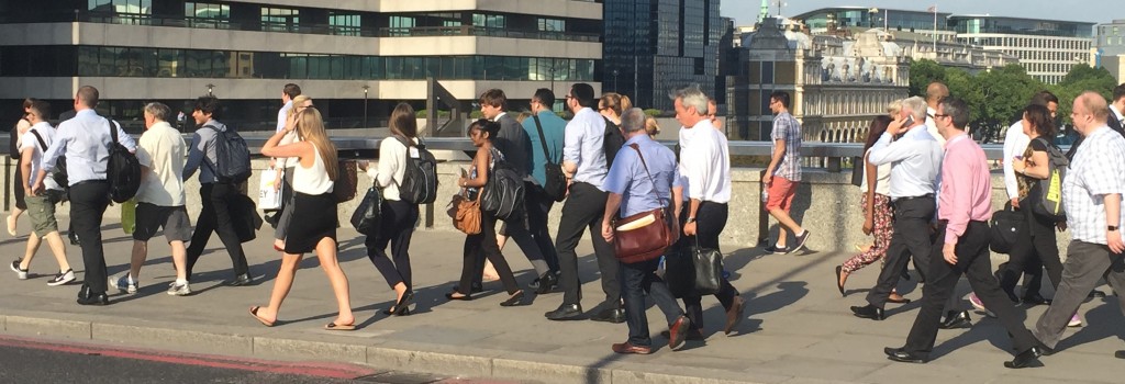 landau law reviews and people walking across bridge to work